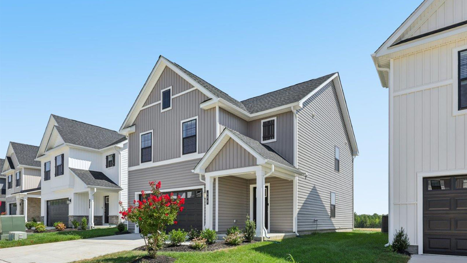 two car garage front load colonial home