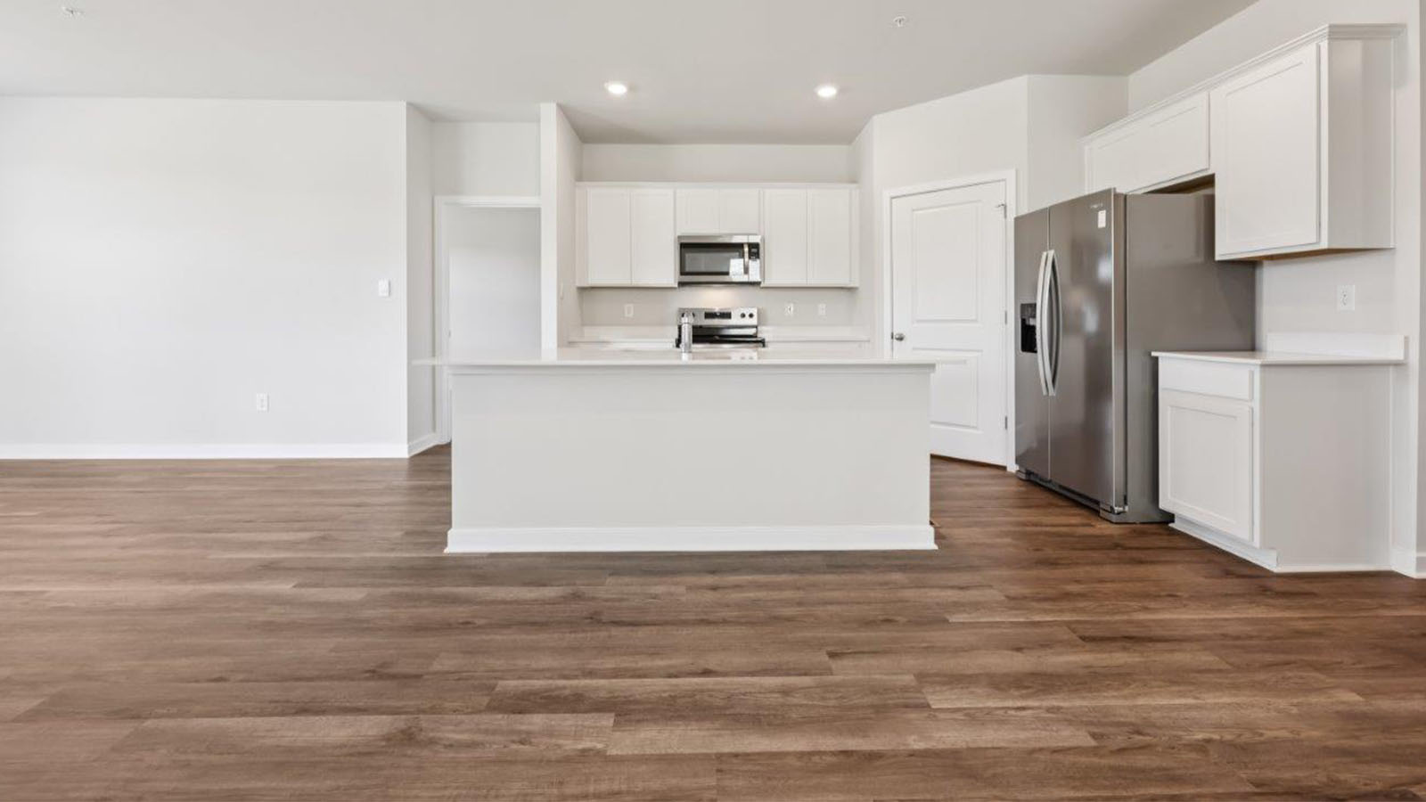 quartz counters and recessed lighting