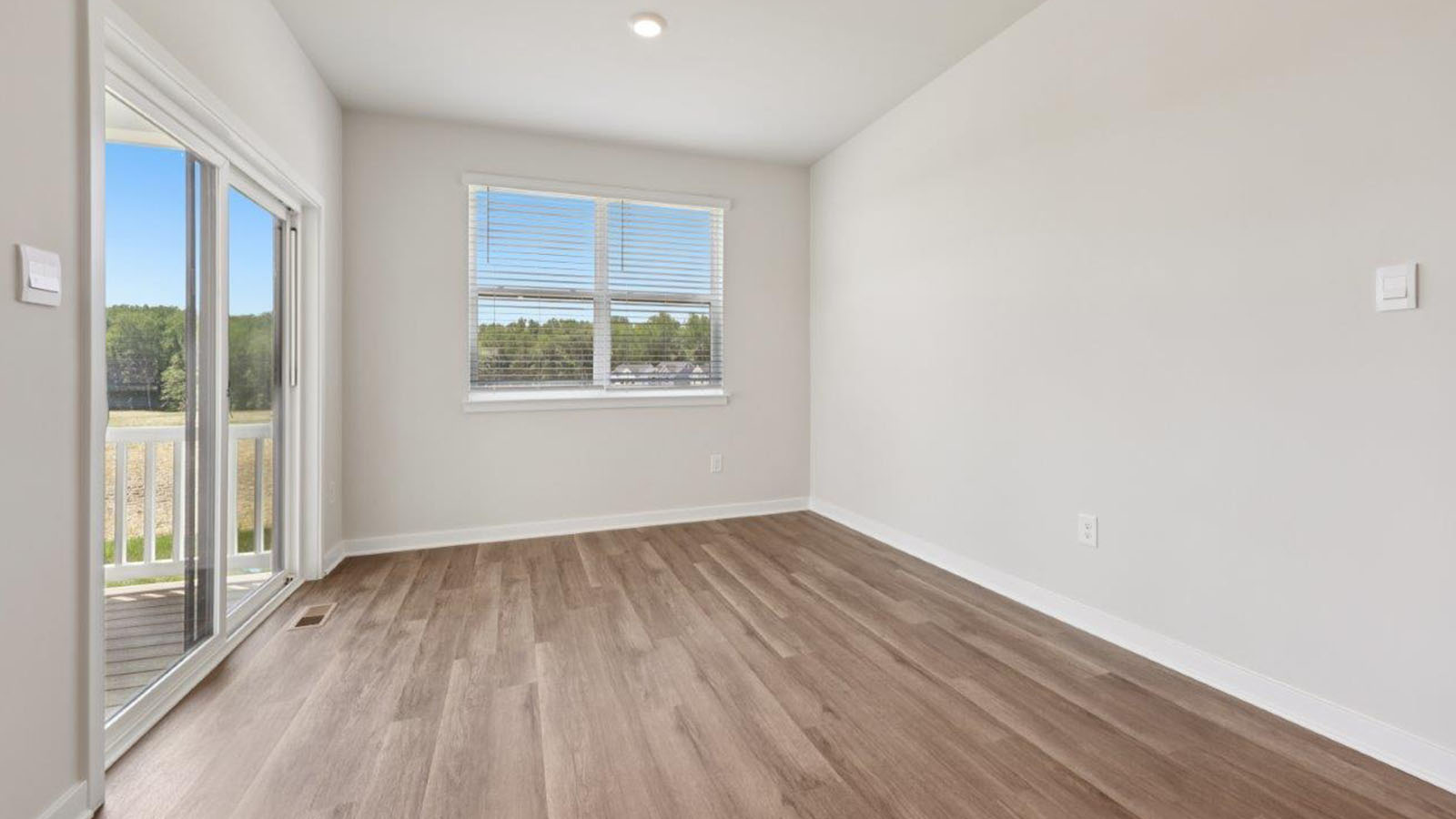 spot for dining table with natural light from sliding back door