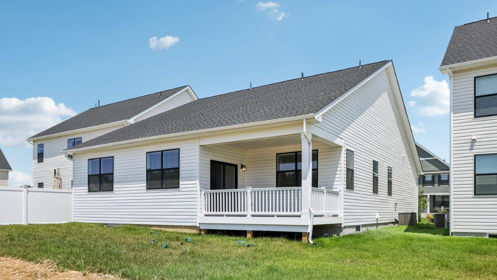 rear of home showing covered deck