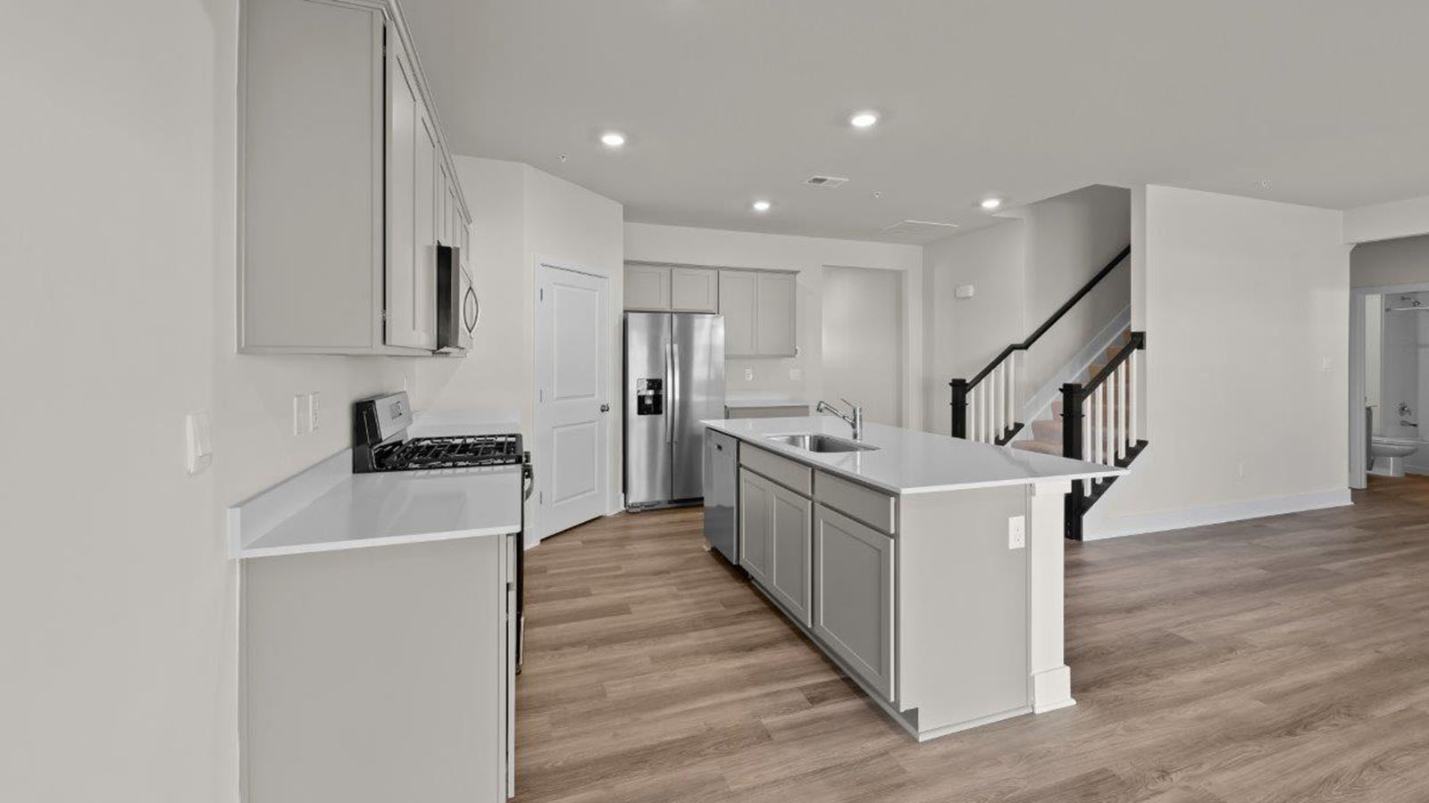 grey shaker style cabinets and quartz counters