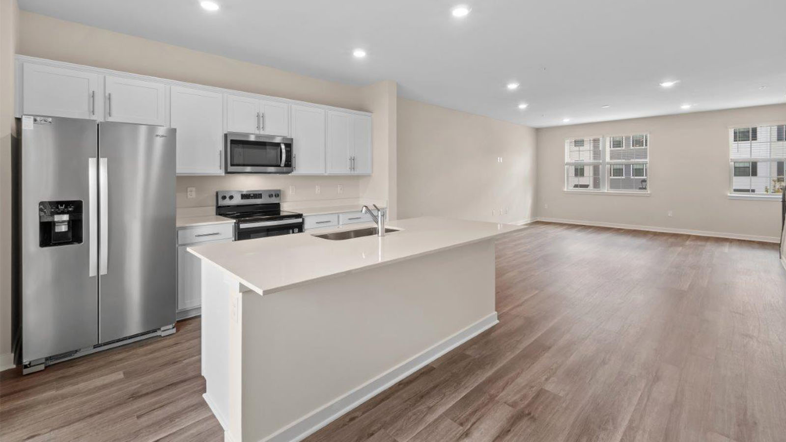 main level kitchen with white cabinets