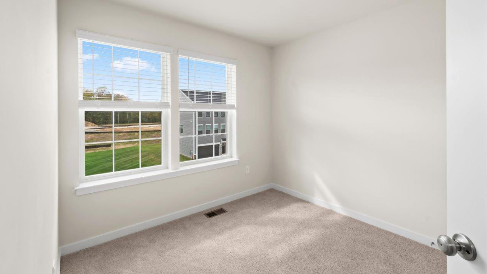 secondary bedroom with carpet