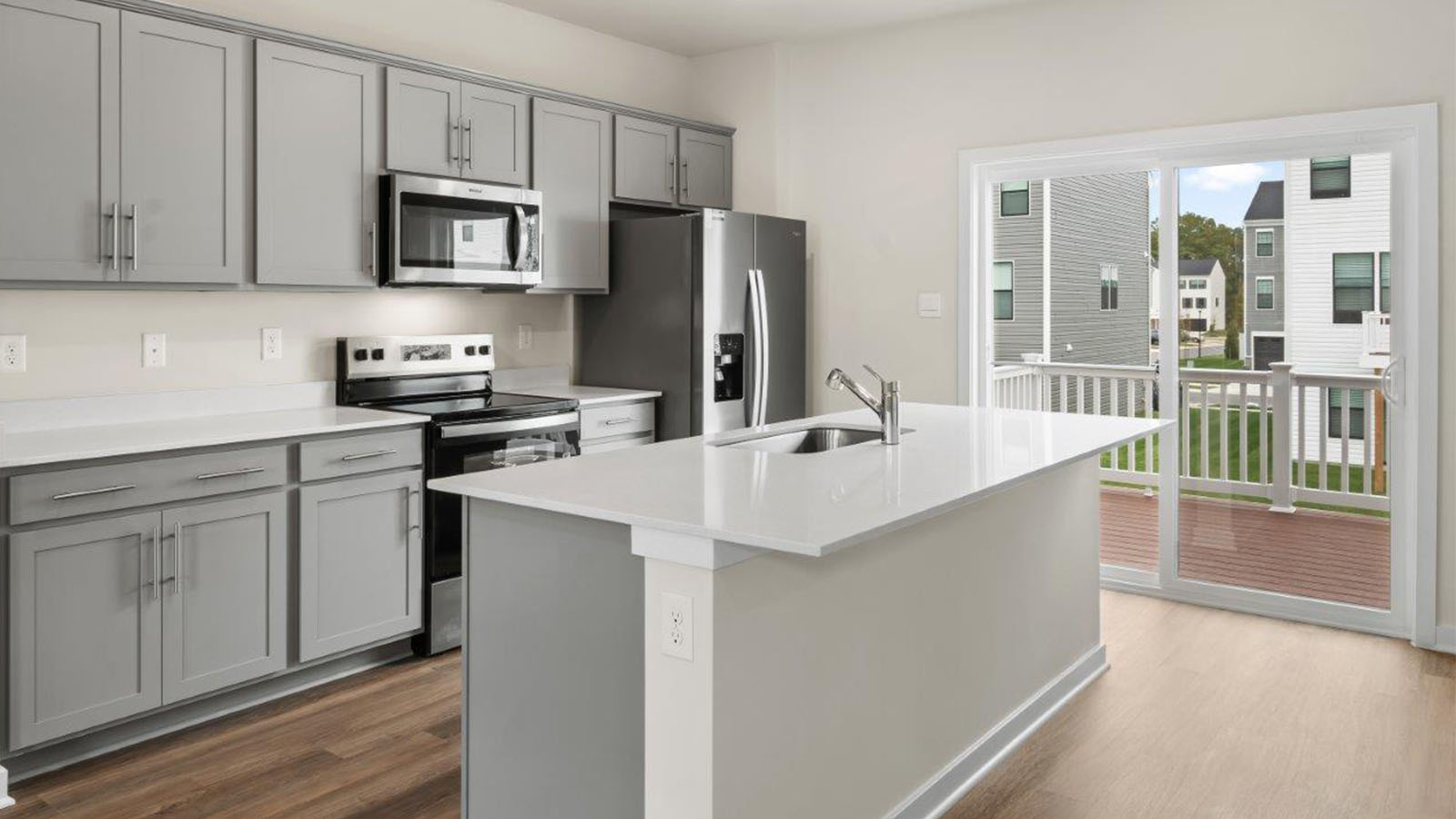 grey shaker cabinets and quartz countertops