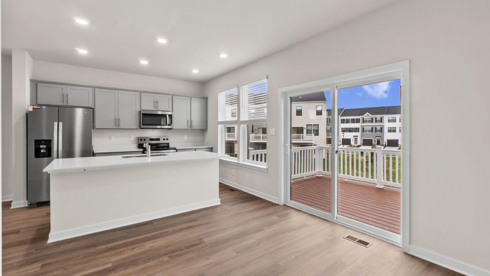 dining table leading to sliding back door