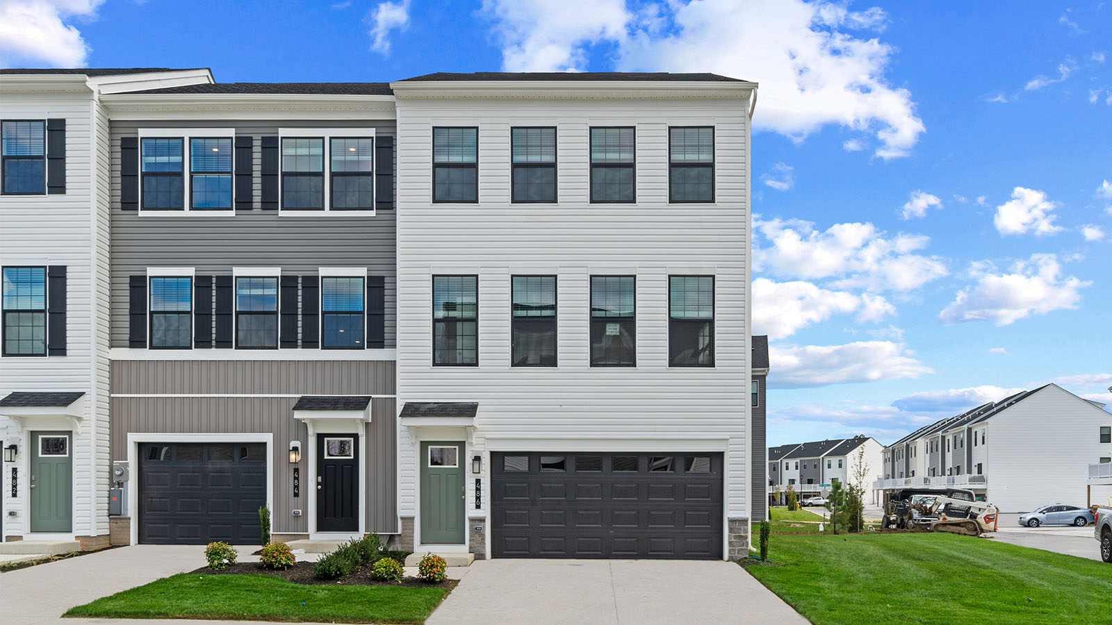 end unit two car garage townhome