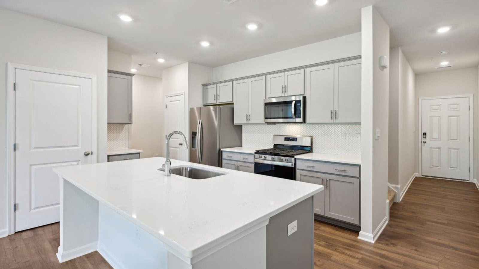 grey shaker cabinets with quartz counters