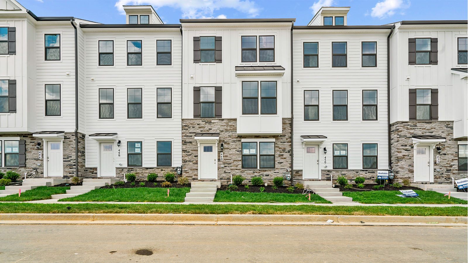 front elevation three story townhome