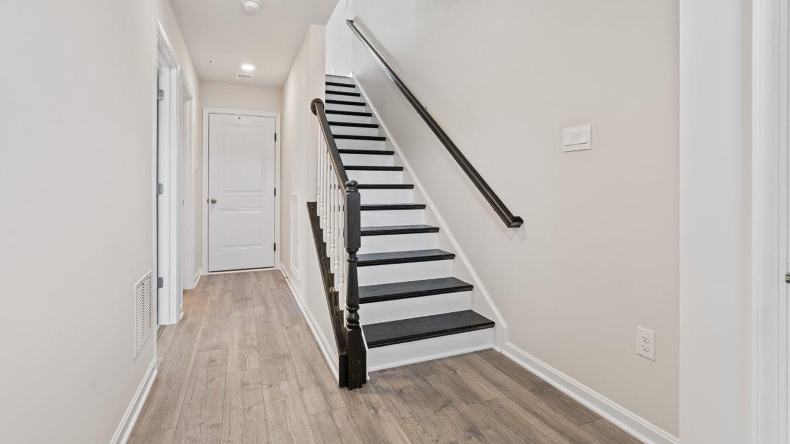 entry staircase and coat closet
