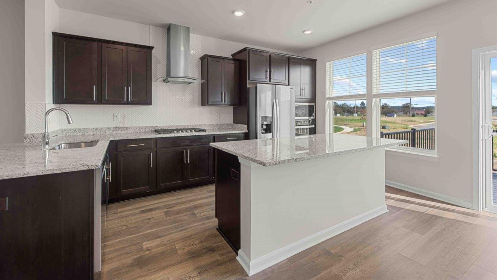 espresso kitchen cabinets with quartz counters