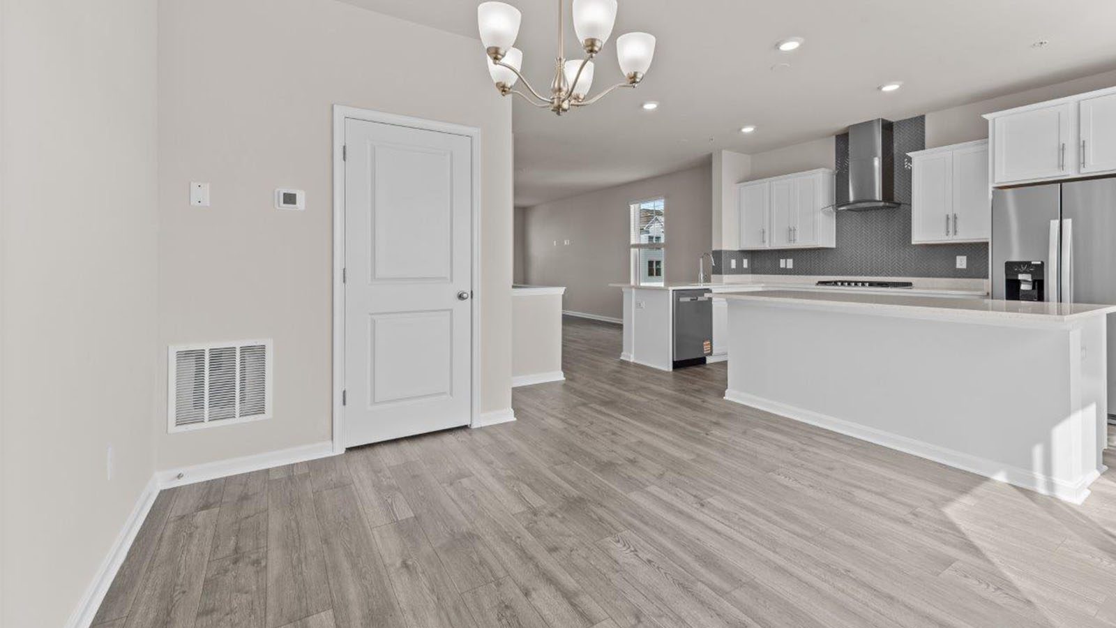 dining area leading to back door