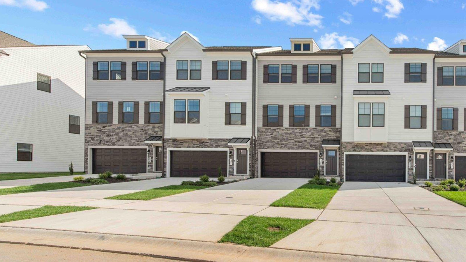 three story townhome with two car garage