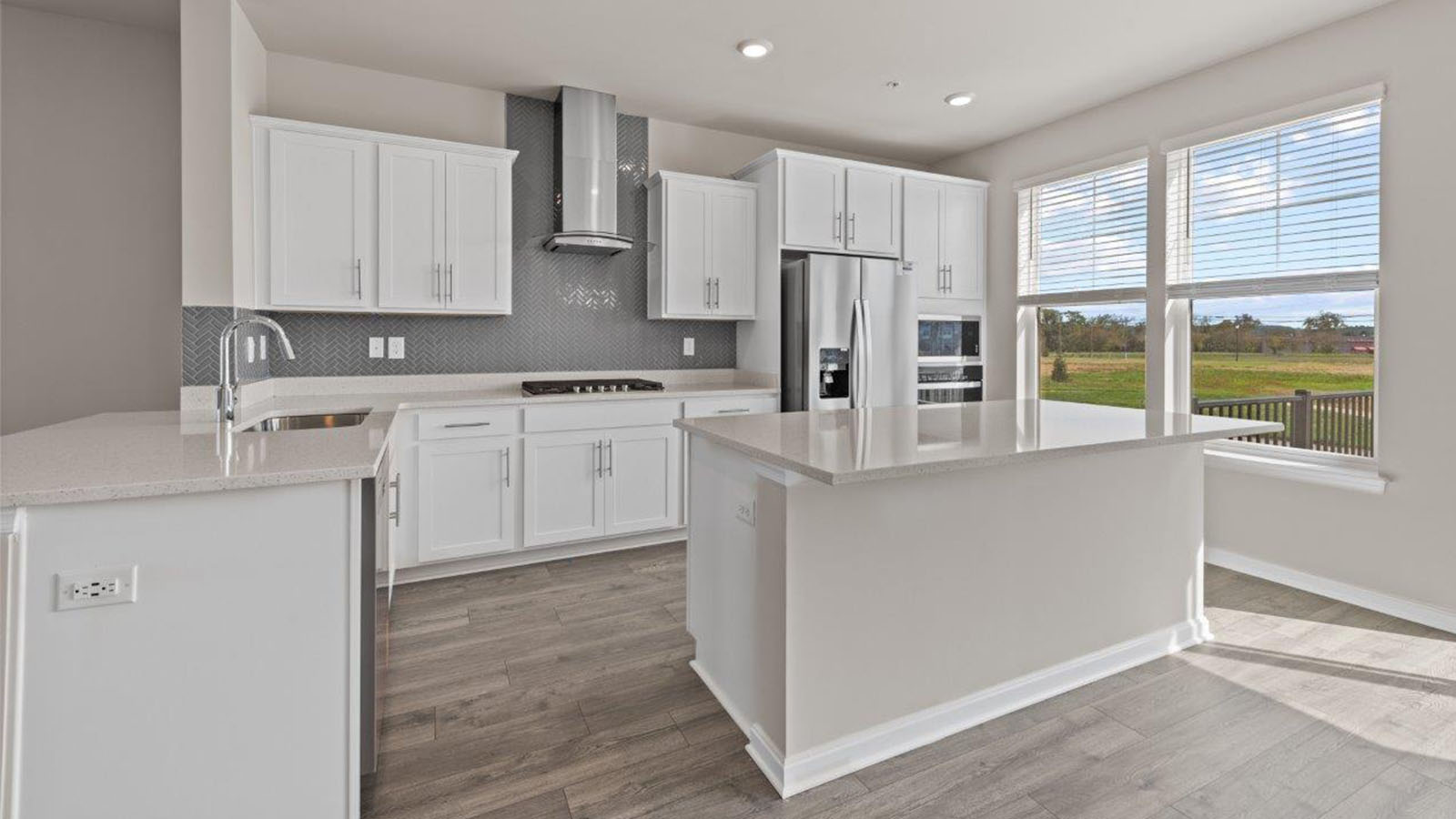 white shaker cabinets and quartz counters
