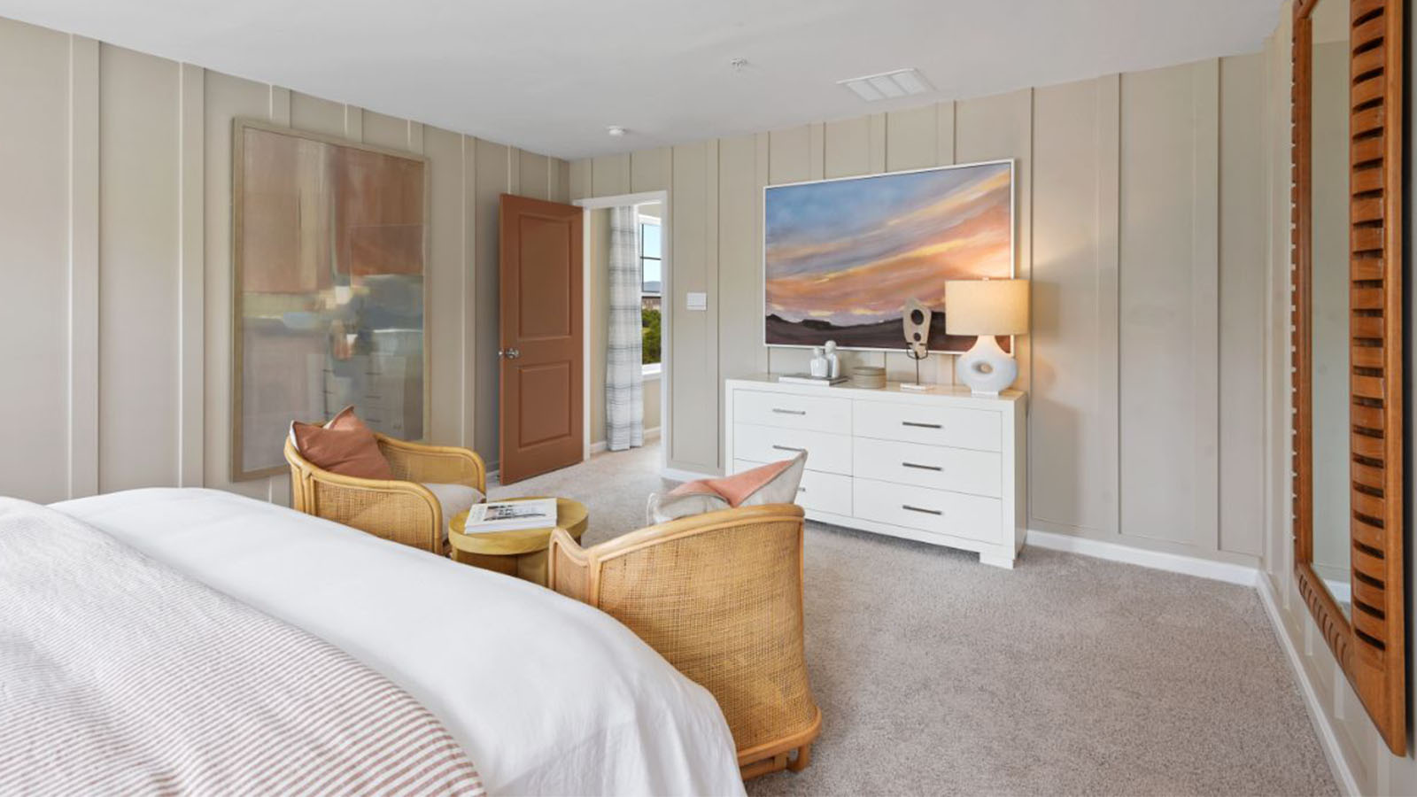 primary bedroom with sitting chairs