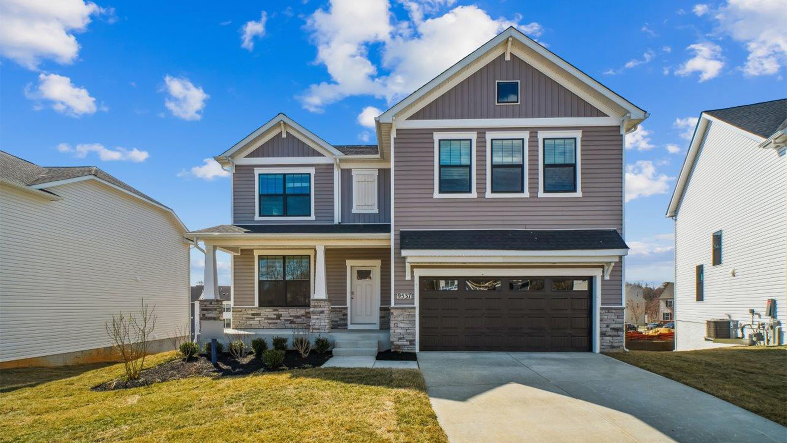 two car front load single family home