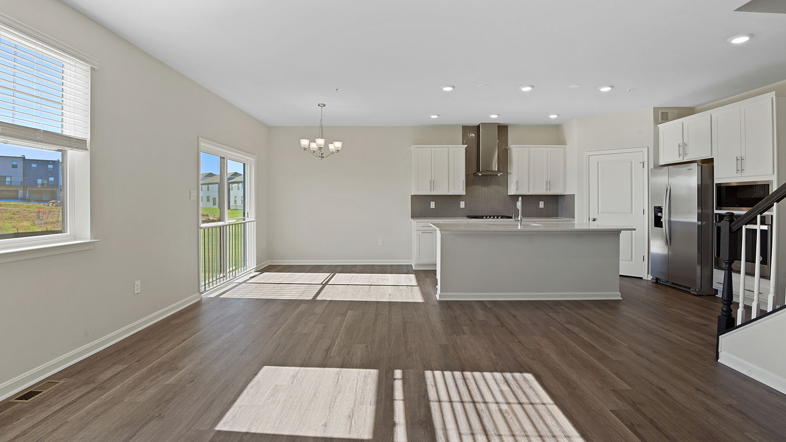 open concept kitchen island facing into living room
