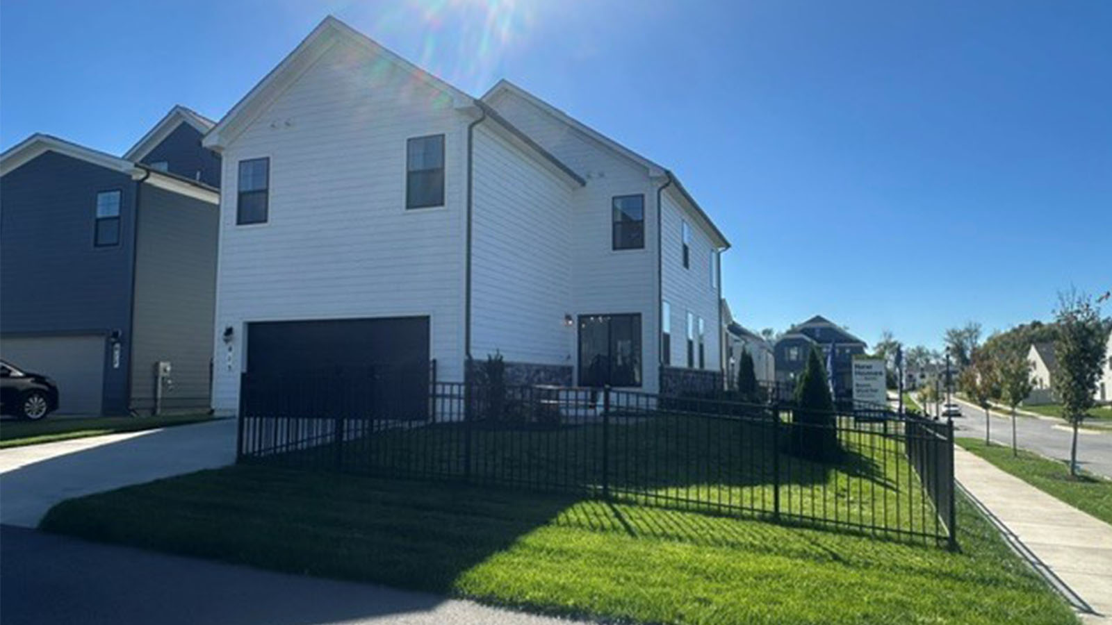 side yard with two car garage