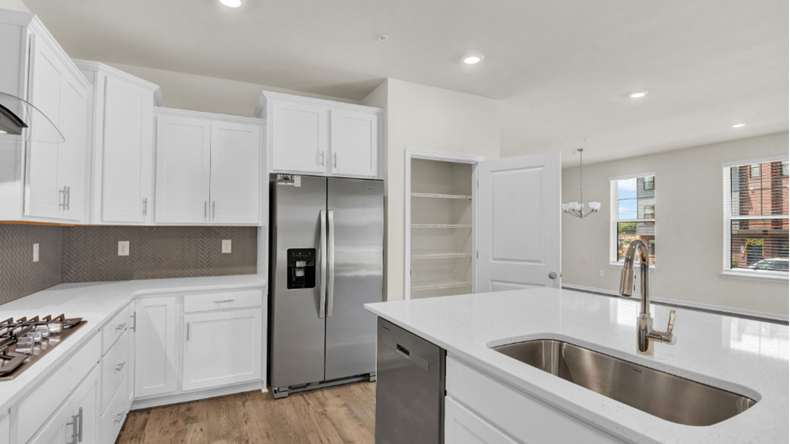 white shaker cabinets and quartz counters