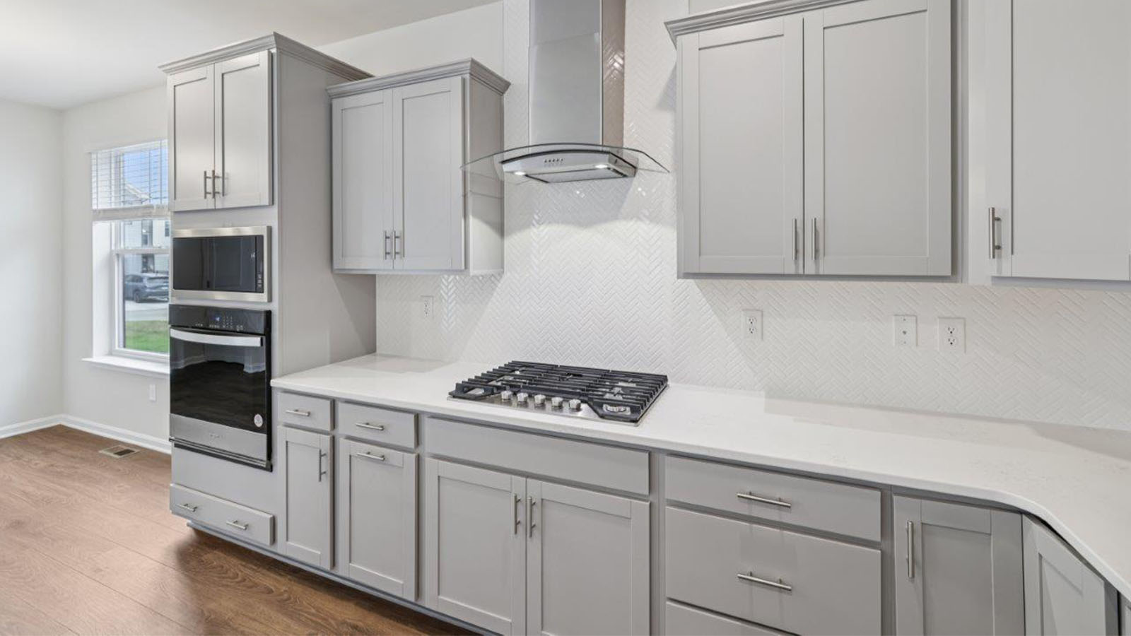upgraded hood fan and backsplash