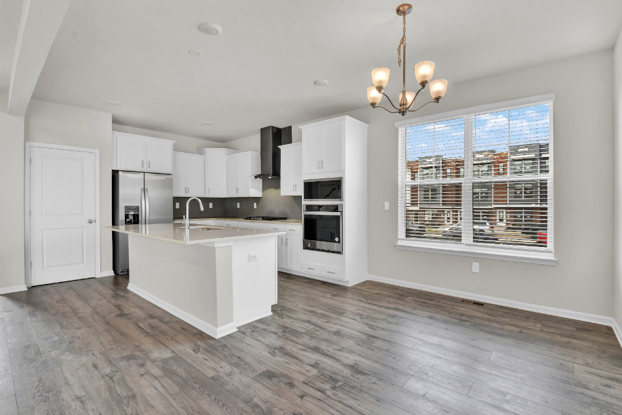 open concept kitchen with spot for dining table