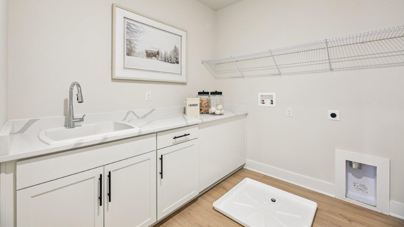 laundry room with folding counter