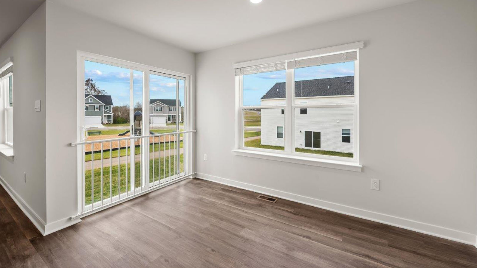 dining area leading to sliding back door