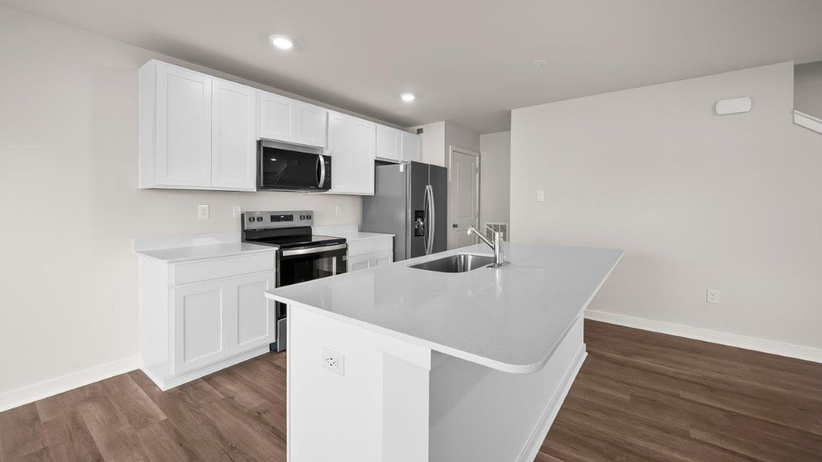 kitchen with white shaker style cabinets