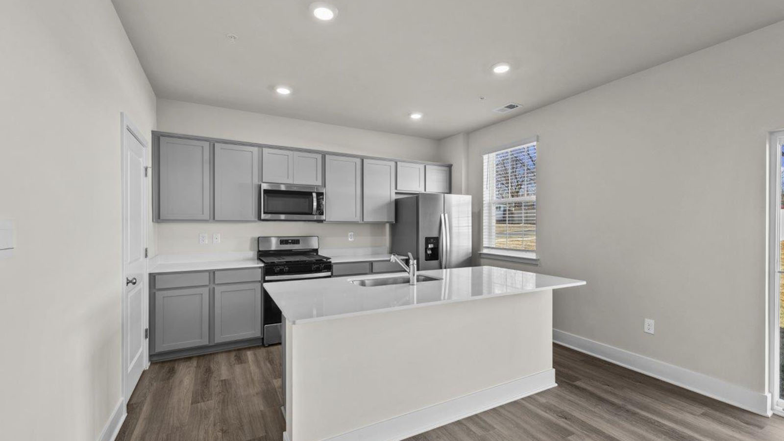 grey shaker style cabinets and quartz counters