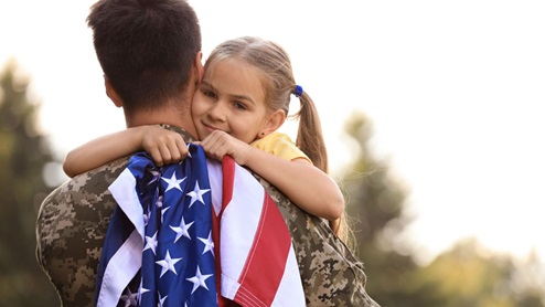 military dad with daughter