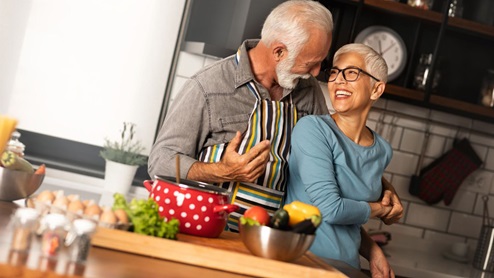 Retired Couple Cooking