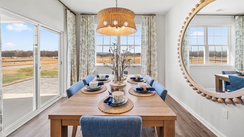 dining table leading to back porch