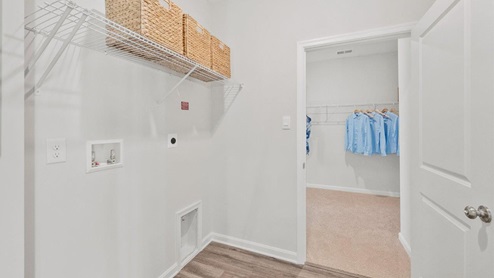 laundry room leading to closet