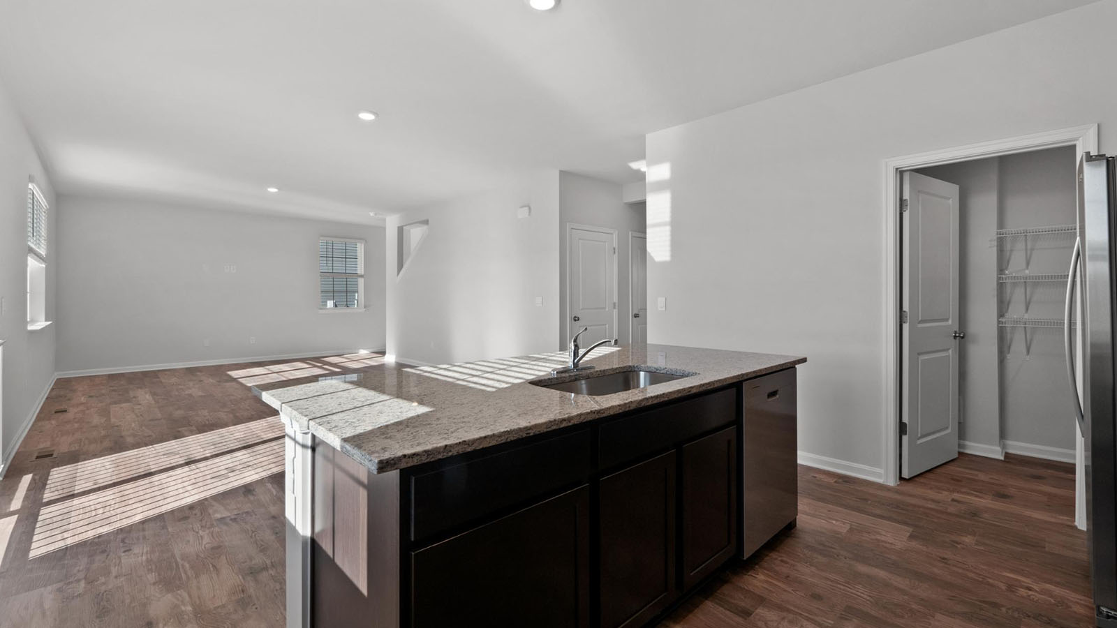 central island with sink and seating