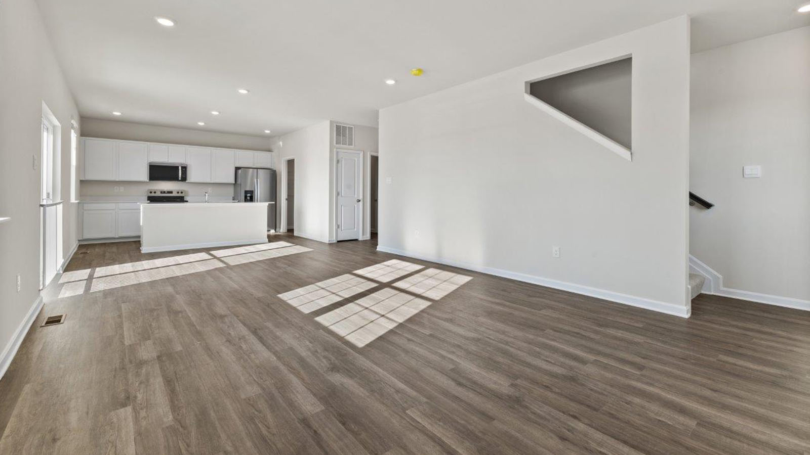 living room with luxury vinyl plank flooring