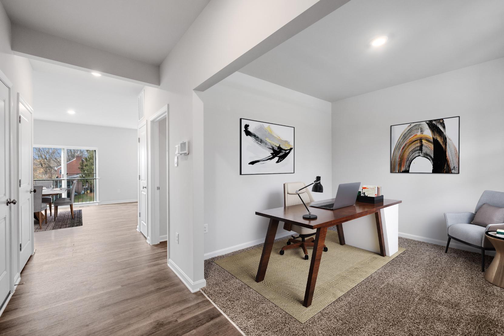 Galen plan office with a desk  and two chairs