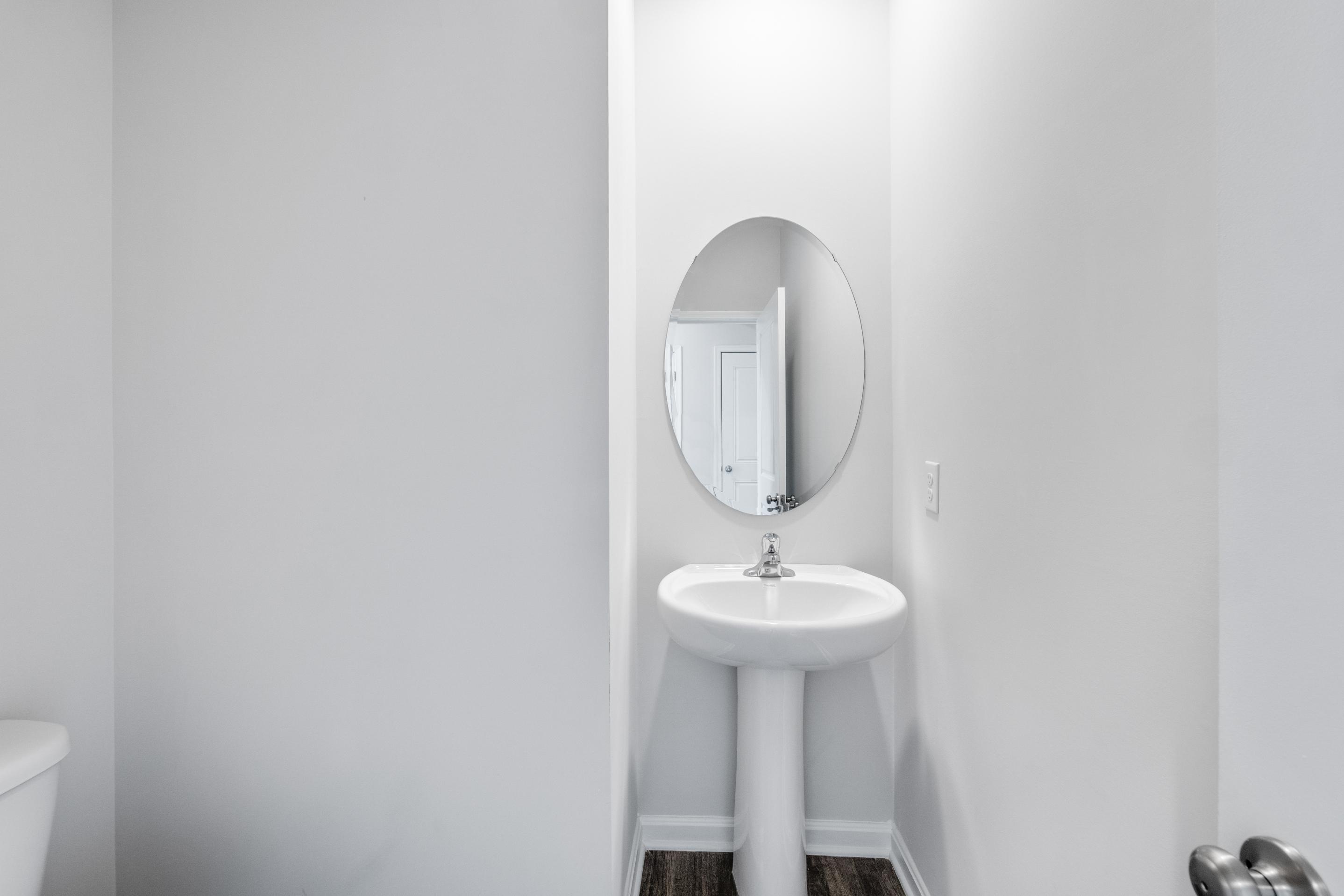 Galen plan bathroom looking at sink with mirror