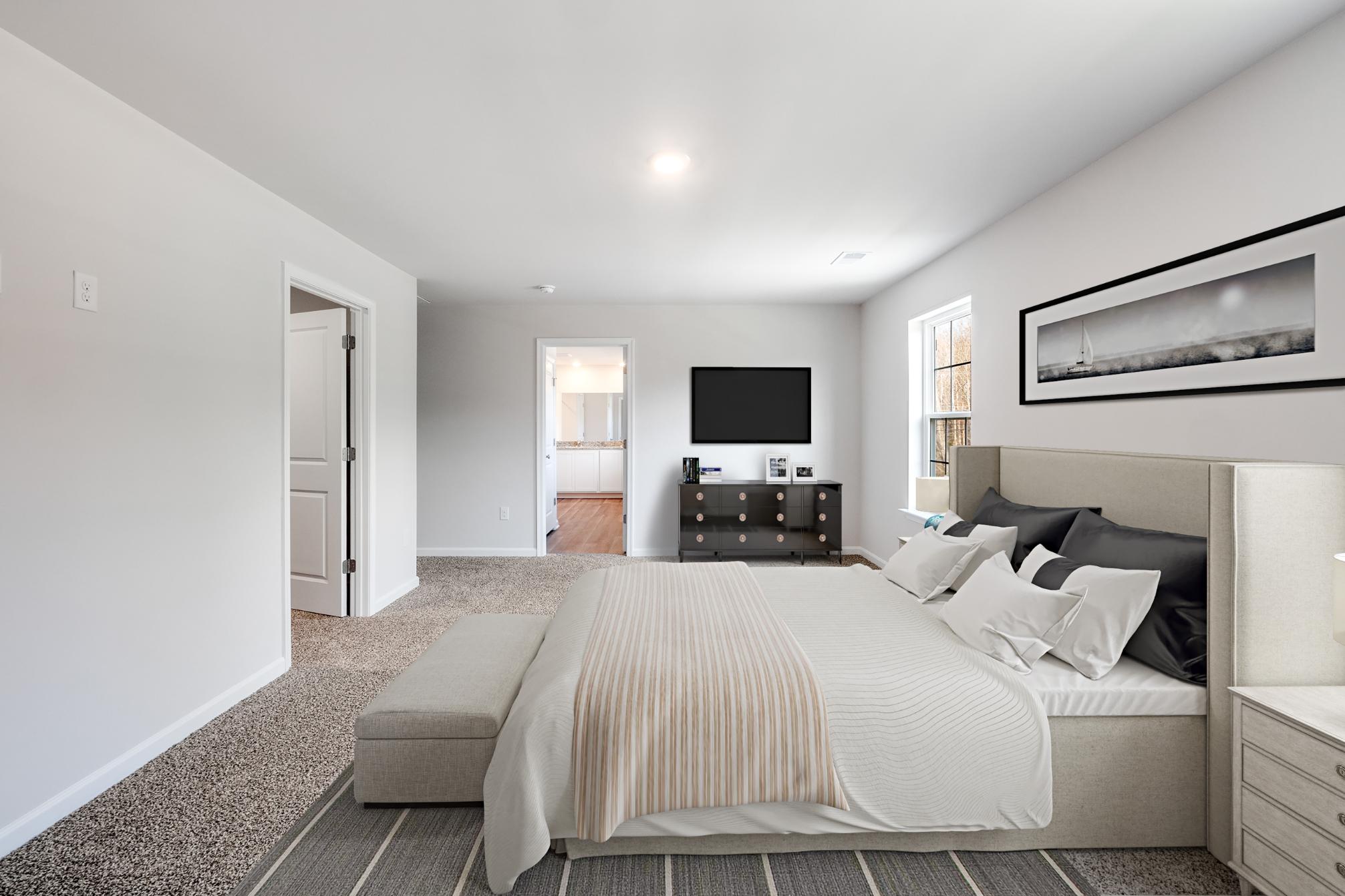 Galen plan bedroom with bed, footboard, nightstand, dresser, tv and window