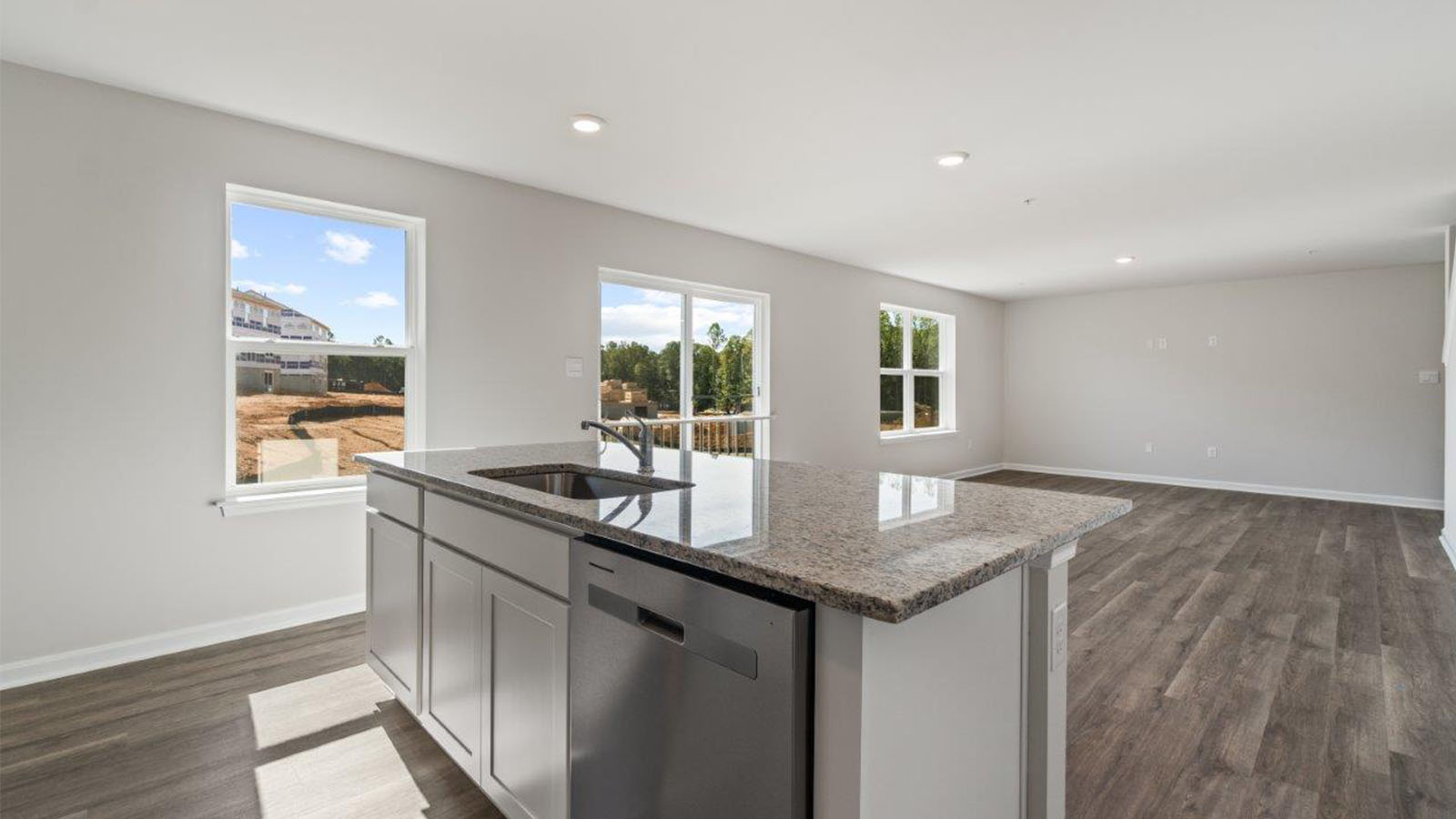 white shaker cabinets and granite counters