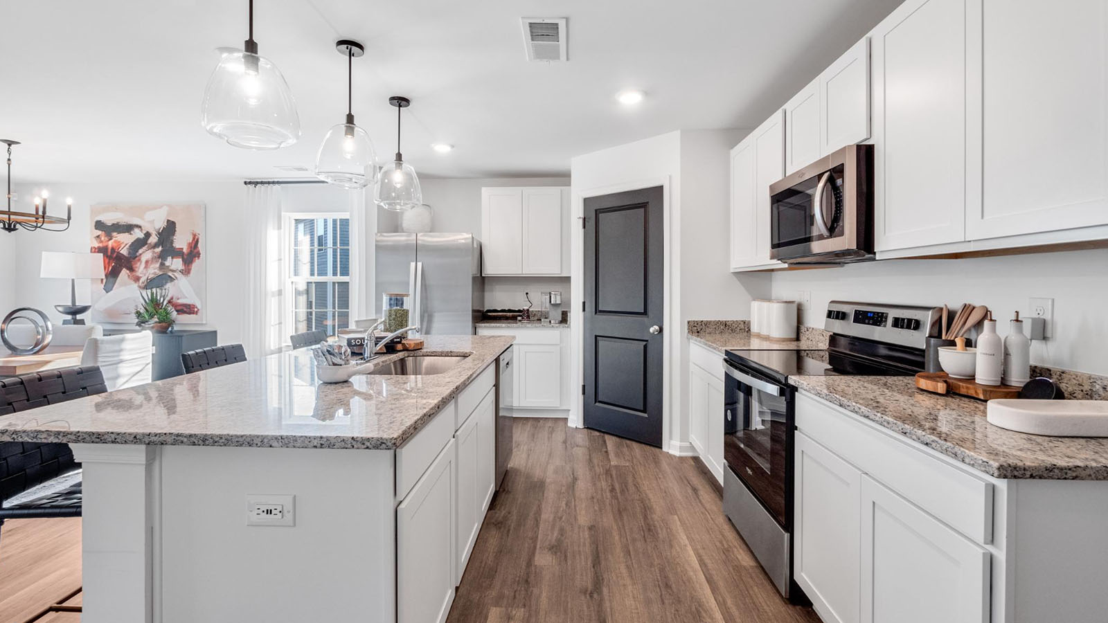 white shaker cabinets and granite counters