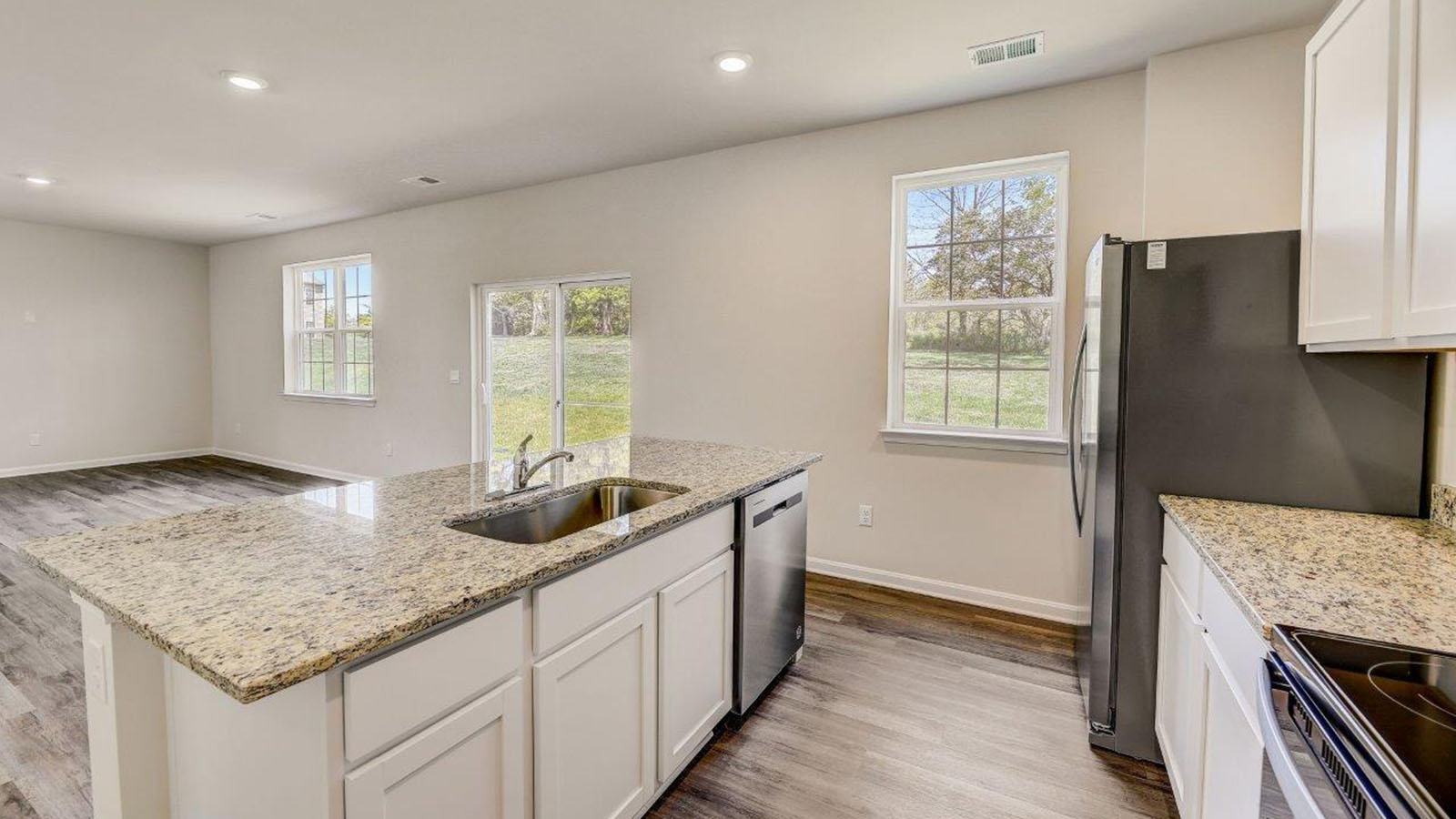 white shaker cabinets and granite counters