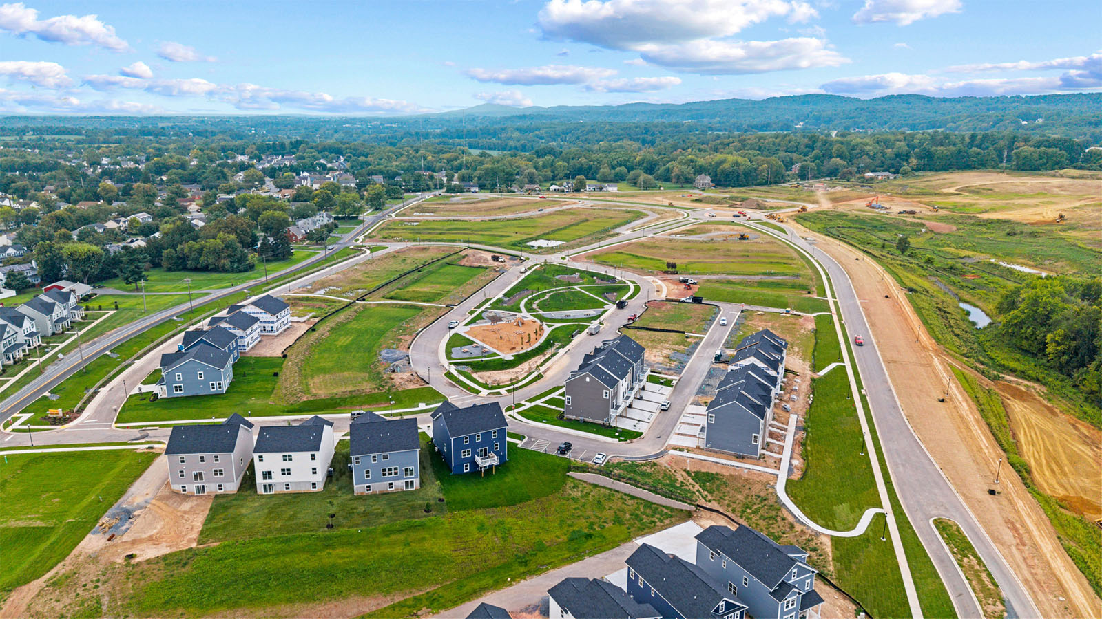 aerial view of community showing mountains in background