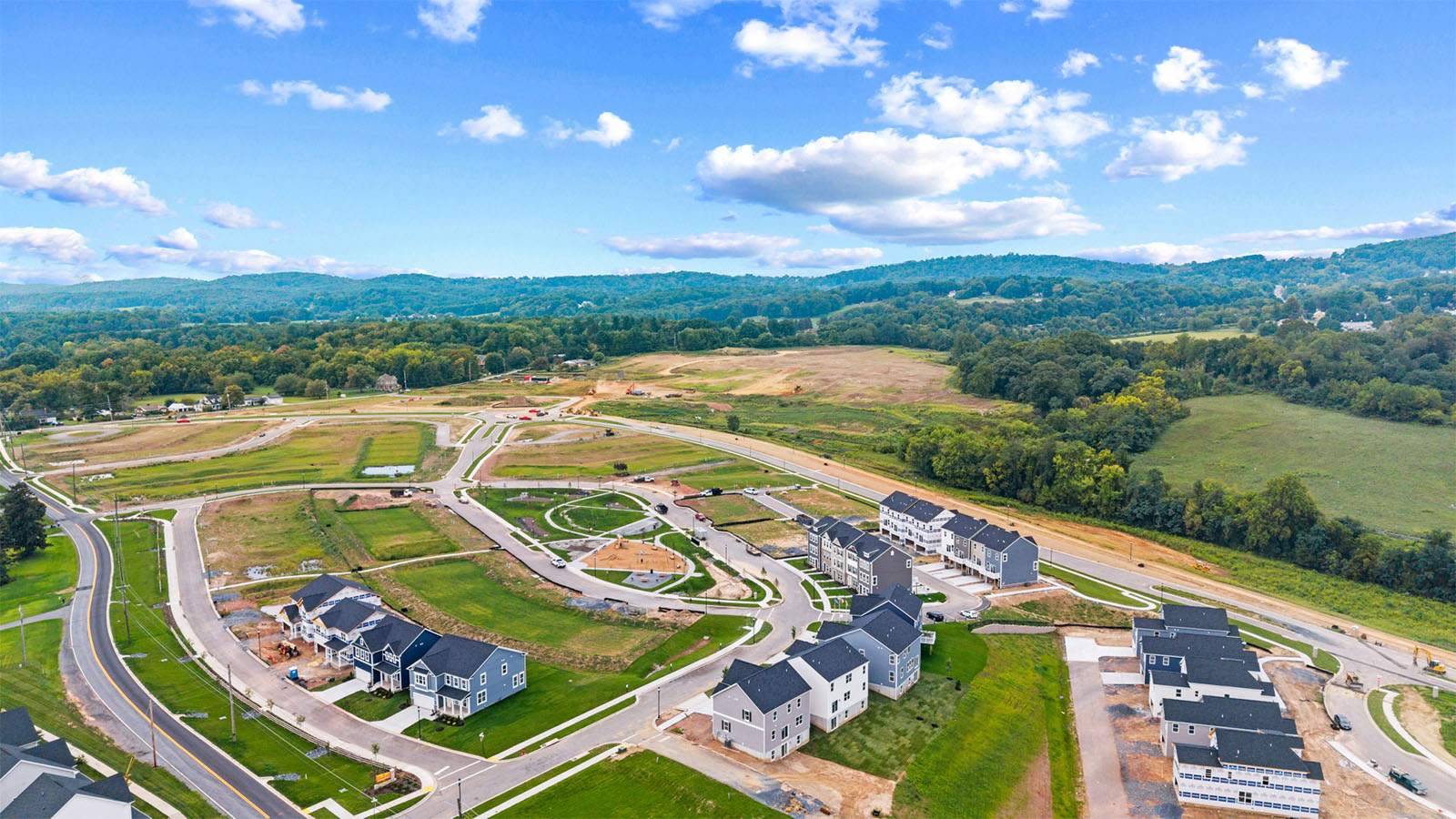 aerial view of community showing mountains in background