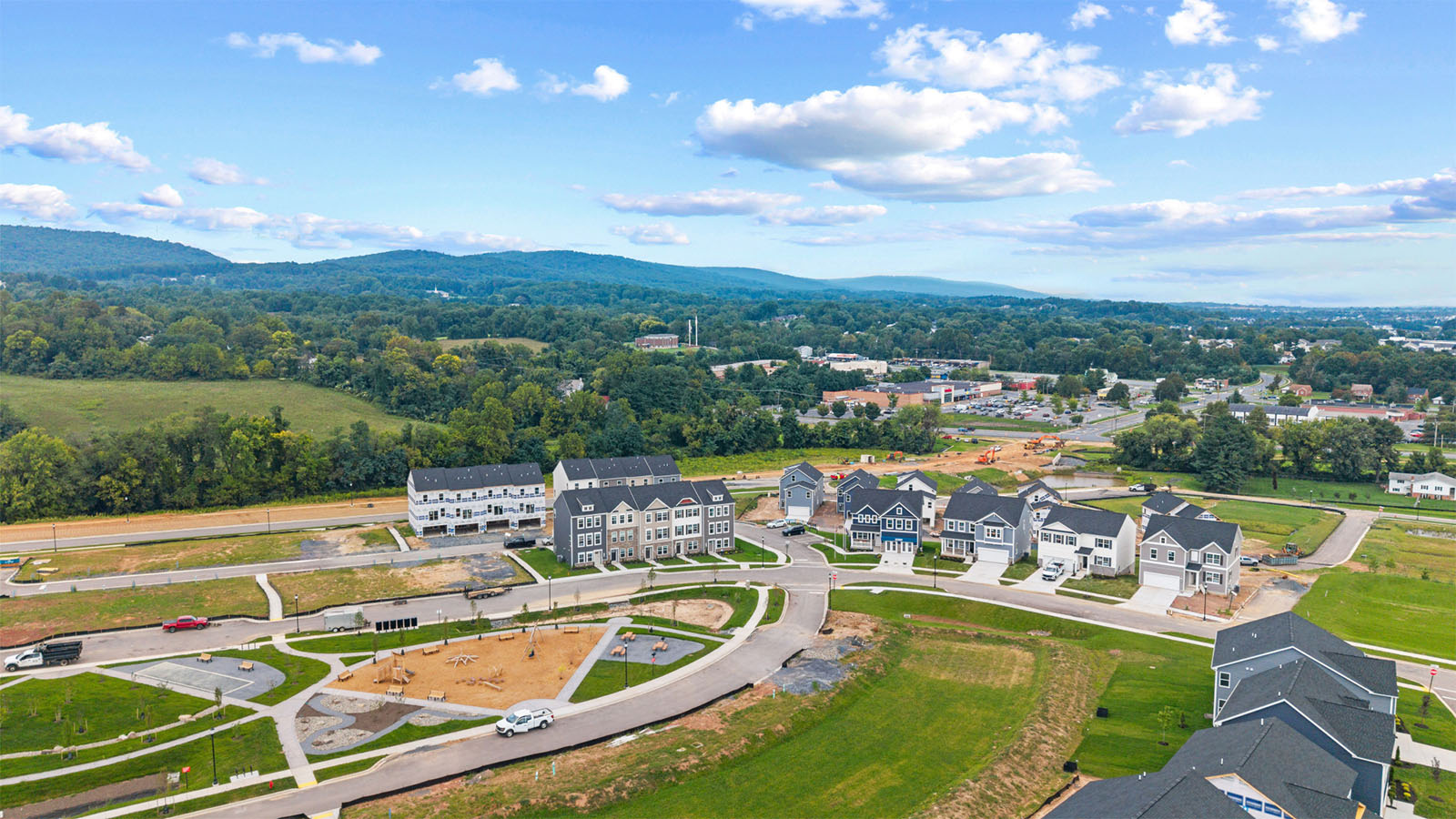 aerial view of community showing mountains in background