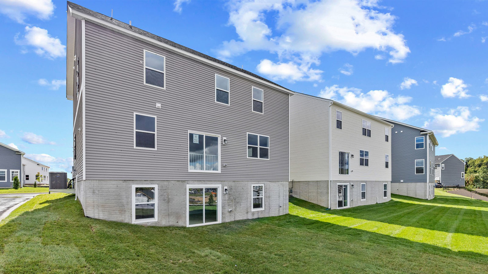 rear of home with basement walkout