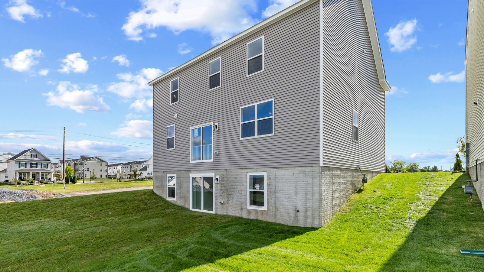 rear of home with basement walkout