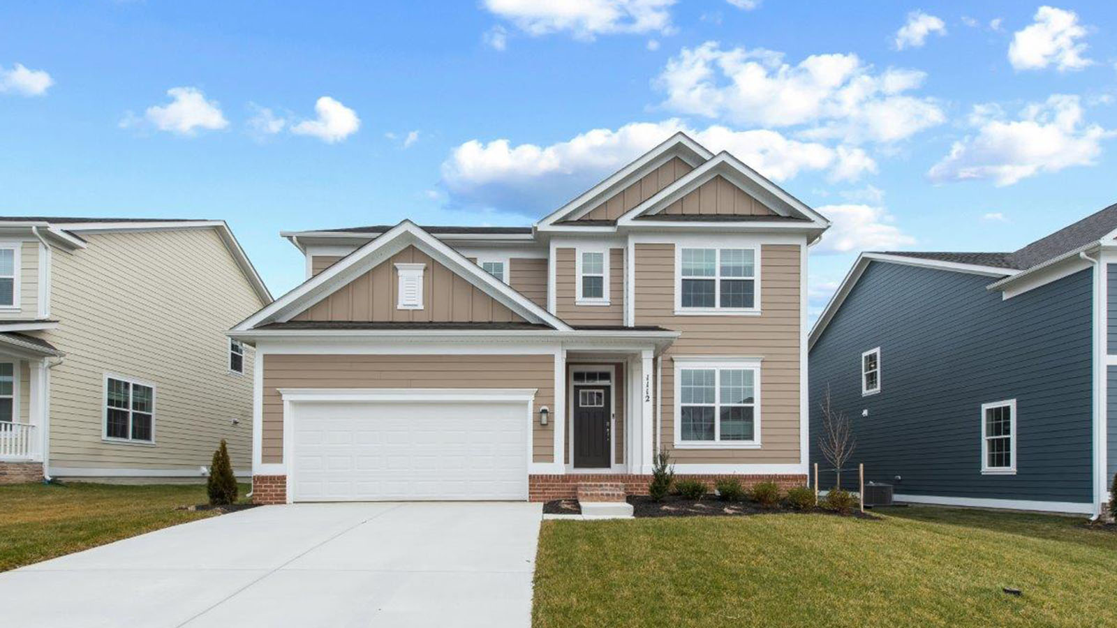 front exterior with two car garage