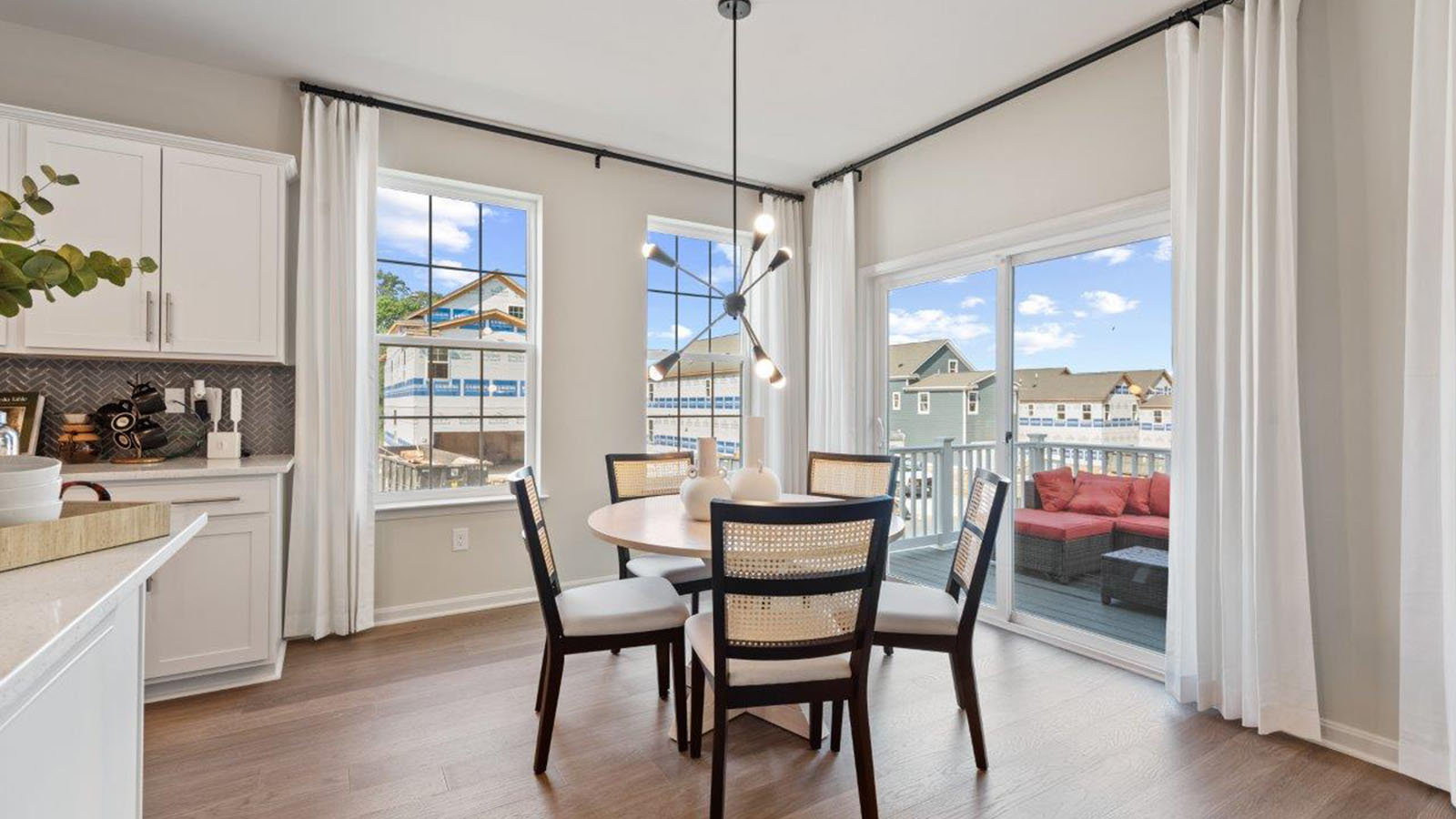 dining table leading to sliding back door