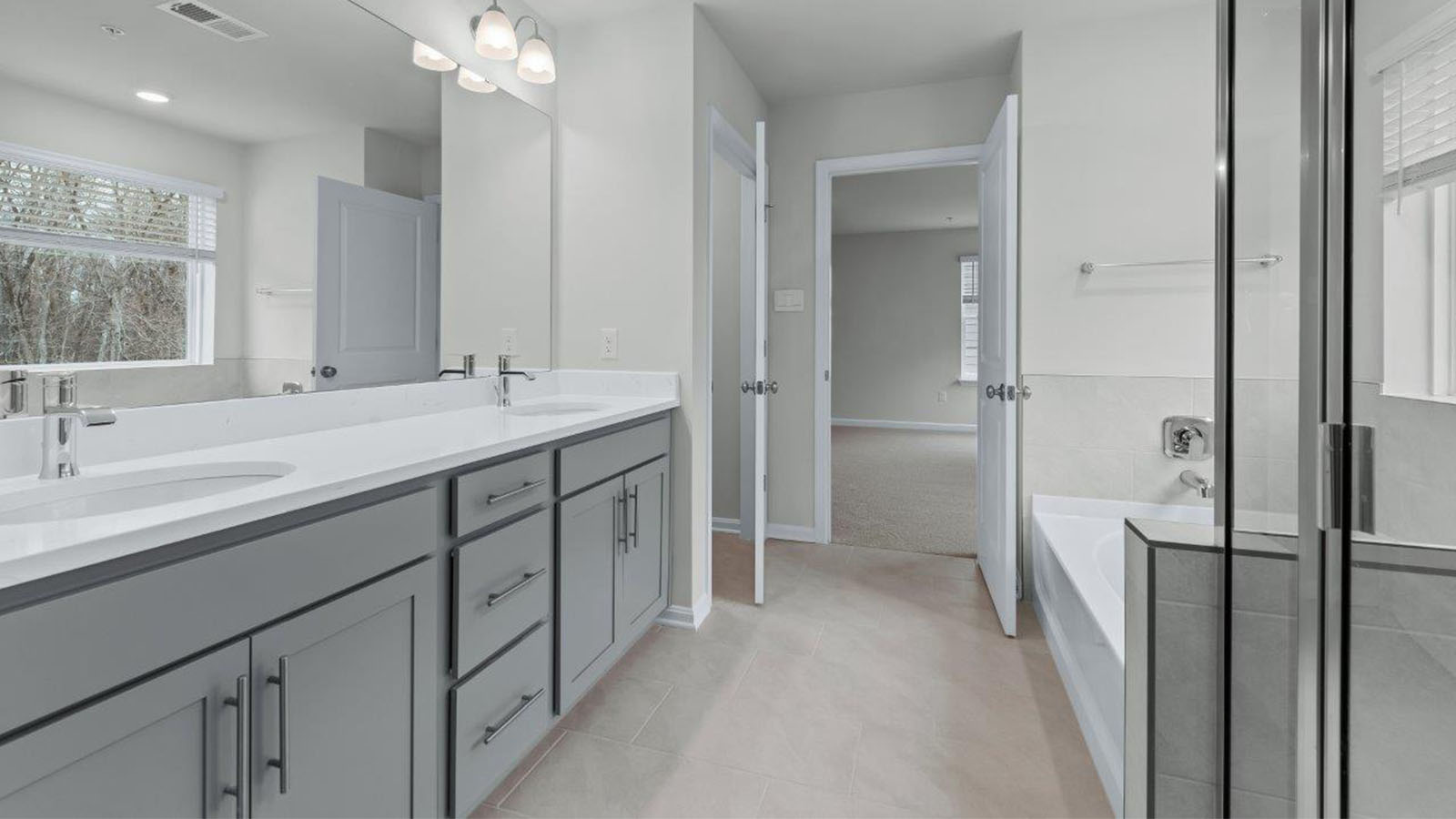 master bath glass shower and soaking tub