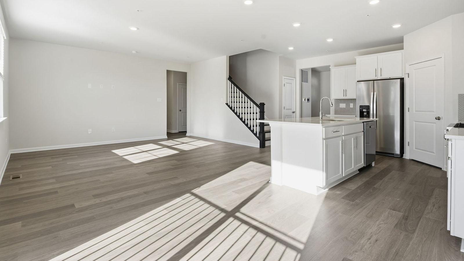open concept kitchen island looking into living