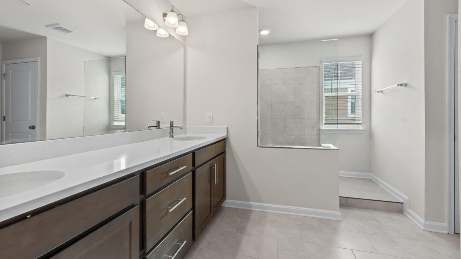 primary bathroom with dual sink